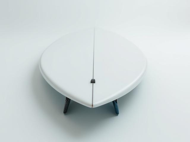 High-performance shortboard with unique fin setup, grey deck, white bottom.